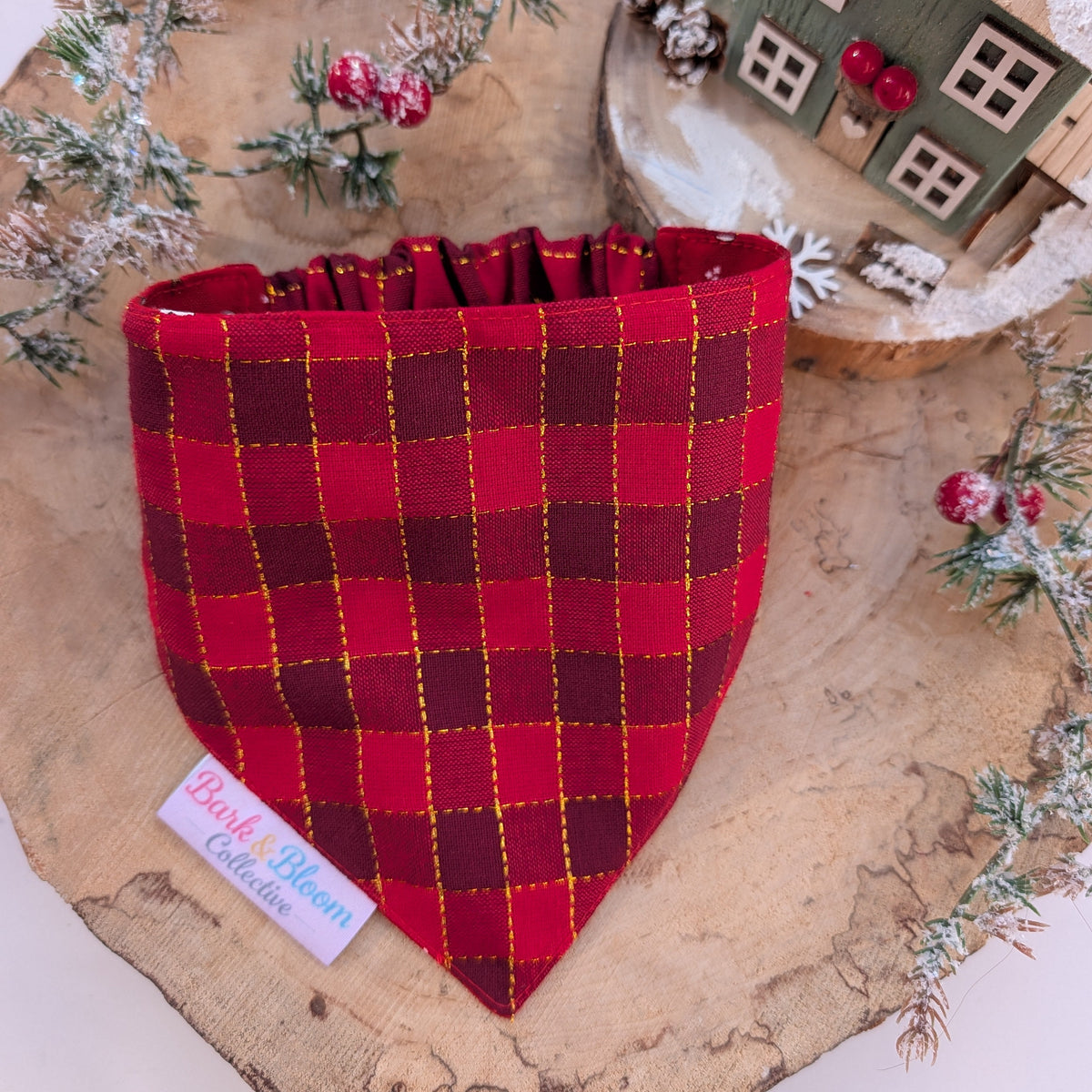 The Mistletoe & Bows Reversible Dog Bandana.