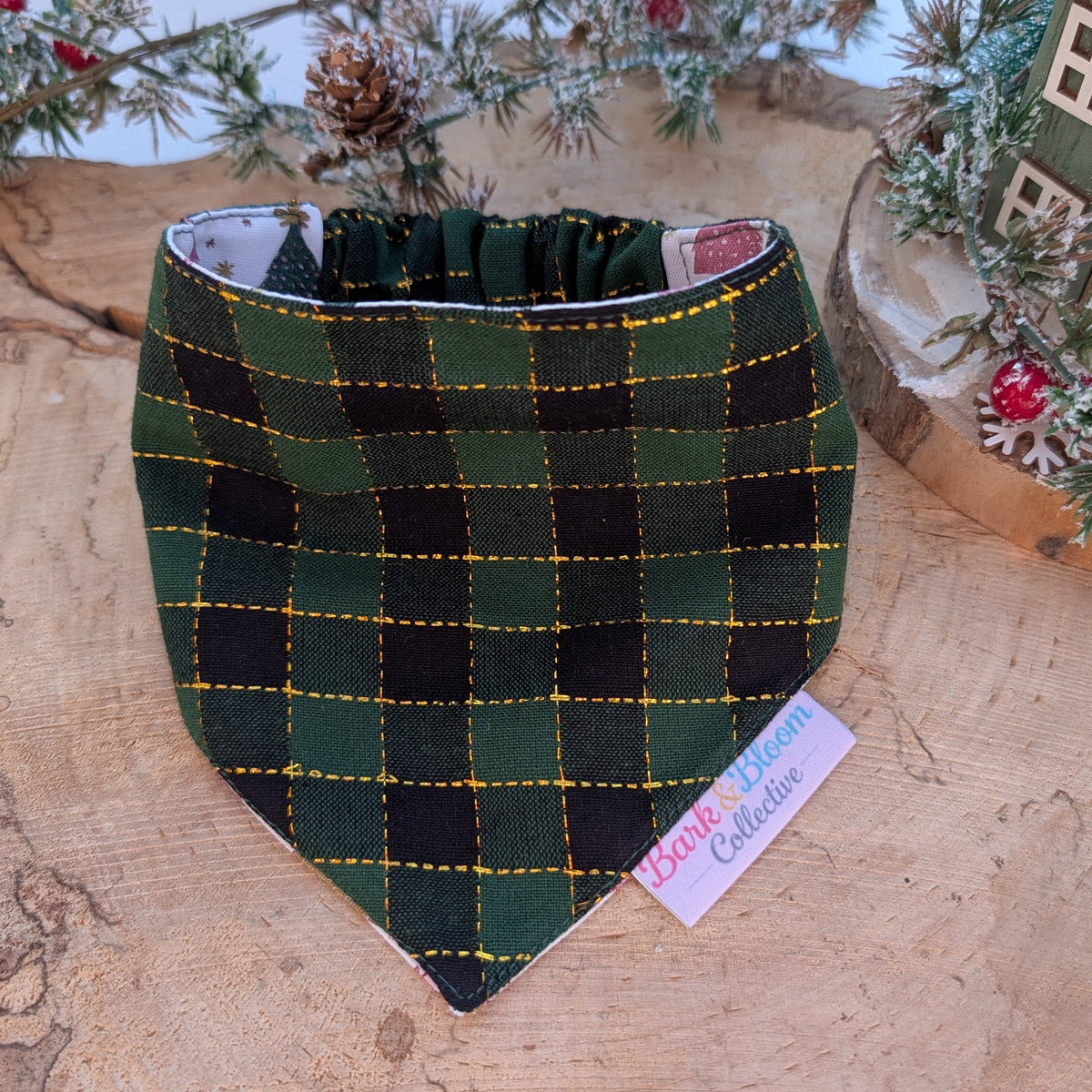 The Mistletoe & Bows Reversible Dog Bandana.